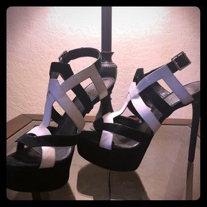 Black and white strapped heels